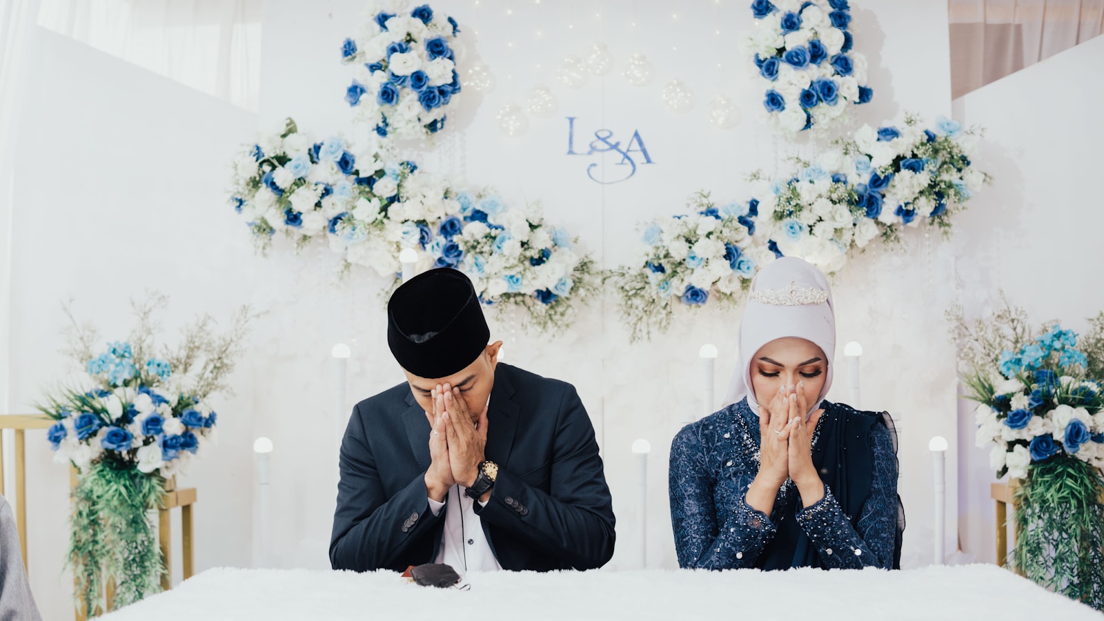 a couple of people sitting at a table